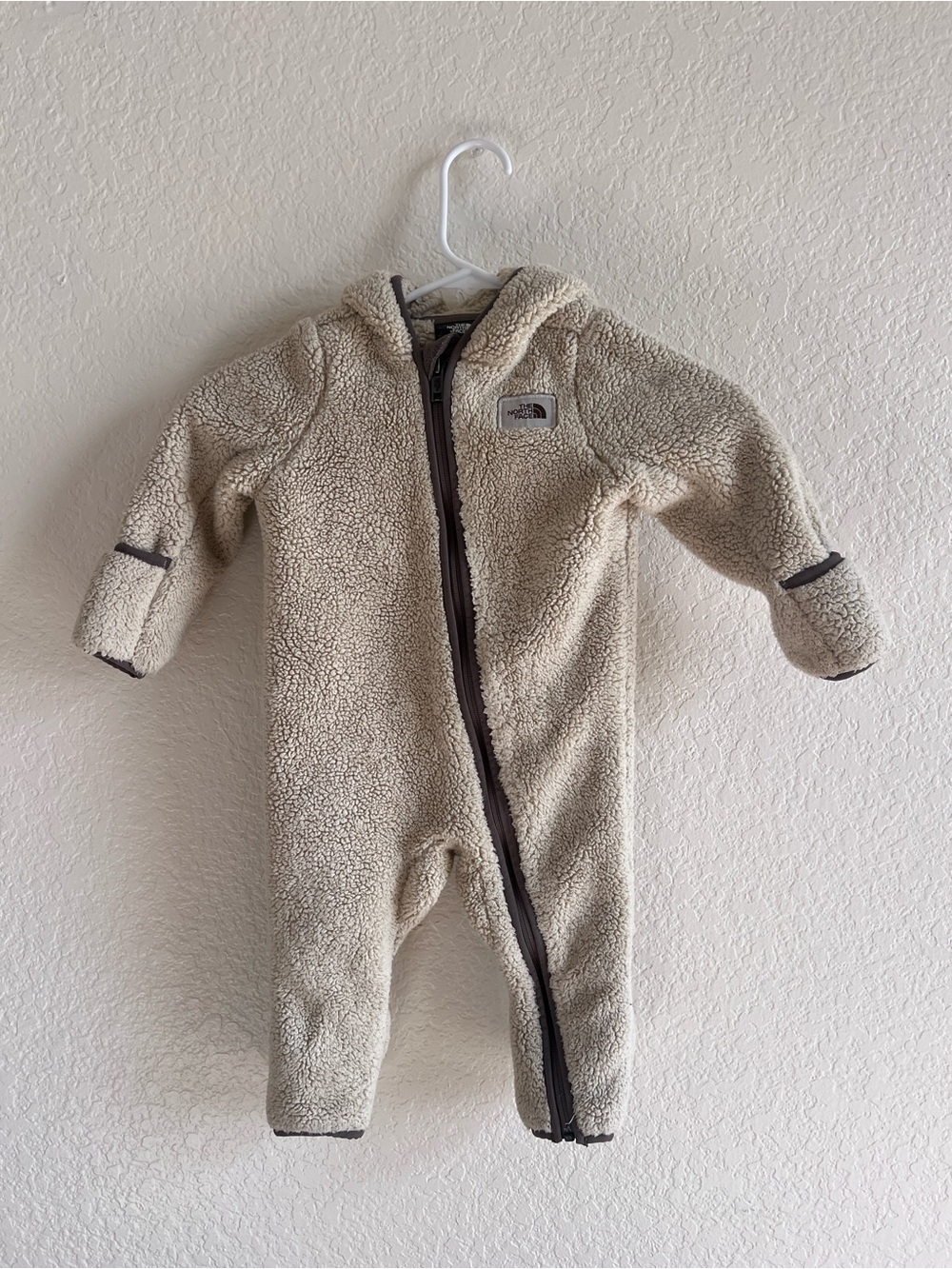 The North Face Cream Sherpa Fleece One-Piece with Hood